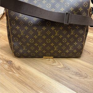 Louis Vuitton Monogrammed Abbesses Messenger Bag in Brown